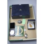 A BAUMER & MERCER EMPTY BOX, silver USA one Dollar 1889, spoon, brooches, etc