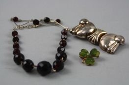 A 9CT SHAMROCK BROOCH AND A SILVER BROOCH AND BEAD NECKLACE (3)