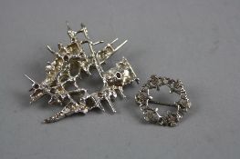 AN ABSTRACT SILVER BROOCH AND ANOTHER