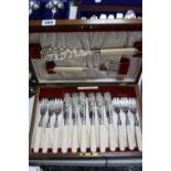 A BOXED FISH KNIVES AND FORKS, silver collared
