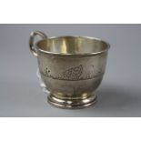 A SILVER MUG CHESTER 1941, decorated with Chickens, total approximate weight 99.8 grams