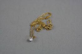 AN 18CT DIAMOND PENDANT ON A 18CT CHAIN, total approximate weight 2.2 grams