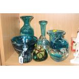 A GROUP OF MDINA GLASS, to include a blue sidestripe vase, a carafe, a flared rim vase and an