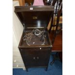 AN OAK CASED HMV GRAMOPHONE, with electrical wiring