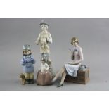 THREE NAO FIGURES AND ANOTHER VALENCIA FIGURE, to include lady sat at a telephone table writing,