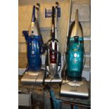 TWO HOOVER AND ONE DIRT DEVIL VACUUM CLEANERS