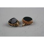 TWO 9CT GOLD HARDSTONE SWIVEL FOBS, total weight approximately 11.2 grams