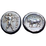 Lucania, Poseidonia AR Stater. Circa 445-420 BC. Poseidon advancing right, wielding trident in