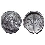 Sicily, Aitna AR Litra. Circa 461-450 BC. Ivy-wreathed head of Silenos right / AIT-NAI, winged