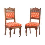 PAIR OF CARVED OAK HALL CHAIRS