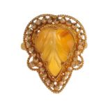 22CT GOLD RING SET WITH CARVED BUTTERSCOTCH JADE