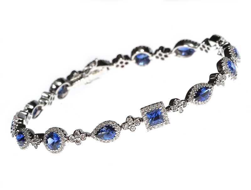 18CT WHITE GOLD SAPPHIRE AND DIAMOND CLUSTER BRACELET