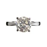 18CT WHITE GOLD AND DIAMOND SOLITAIRE RING