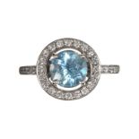 18CT WHITE GOLD BLUE TOPAZ AND DIAMOND CLUSTER RING