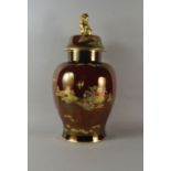 A Charltonware Chinese taste vase and lid, 20th century, the lid with lion form finial, of red