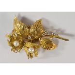 An 18ct gold, pearl and diamond set floral brooch, Birmingham c.1972, approx 5.5cm long, approx 13.