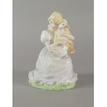 A Coalport porcelain figure of the Goose Girl, from a model by Stella Mitchell, no. 5146 of 9400,