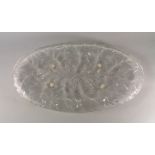 A large Lalique glass oval platter, late 20th century, moulded with leaf form decoration, engraved