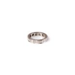 A diamond eternity ring, mounted in unmarked white metal, approx size N, approx 4.9g.