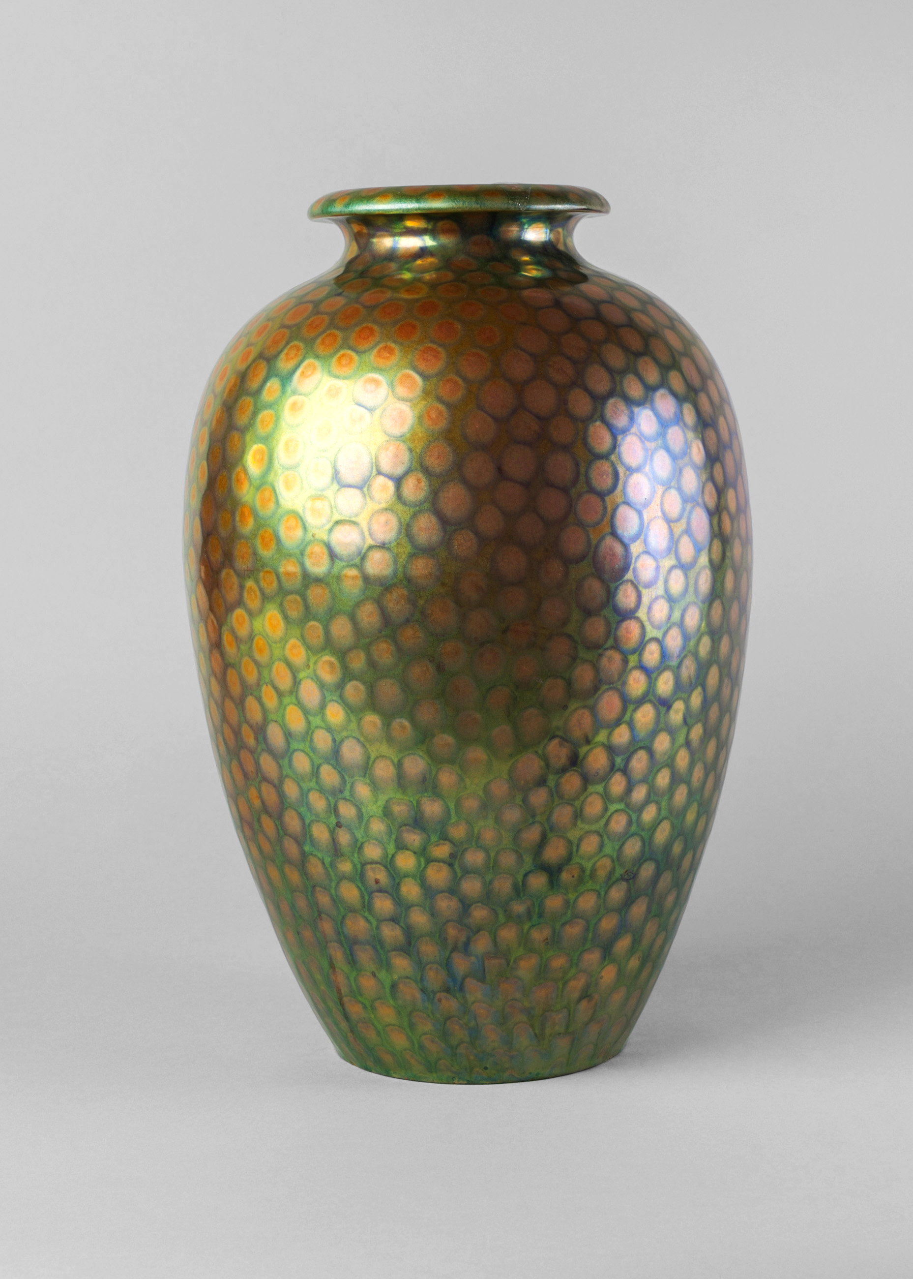 A Zsolnay Pecs baluster vase, with spotted lustre glaze, 32cm high, gilt factory marks to base.