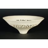 Peter Lane, British, b.1935, a cream earthenware bowl with pierced hole decoration, artist's