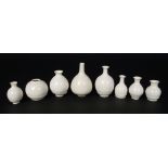 Yuta Segawa, Japanese b.1988, a group of white miniature pots in glazed porcelain, each signed on