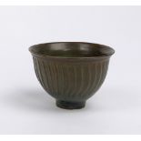David Leach, British 1911- 2005, a small glazed fluted bowl, makers mark on reverse, 7x10cm (ARR)