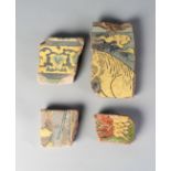 A group of Mughal cuerda seca tile fragments, probably from the tomb of Madan Sahib in Srinagar,