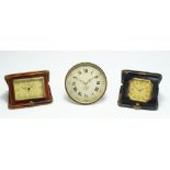 A Guglianetti rectangular travel clock, in leather case,