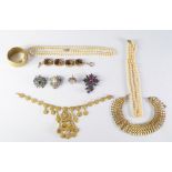 A miscellaneous collection of costume jewellery, contained in a brass bound wooden jewellery box,