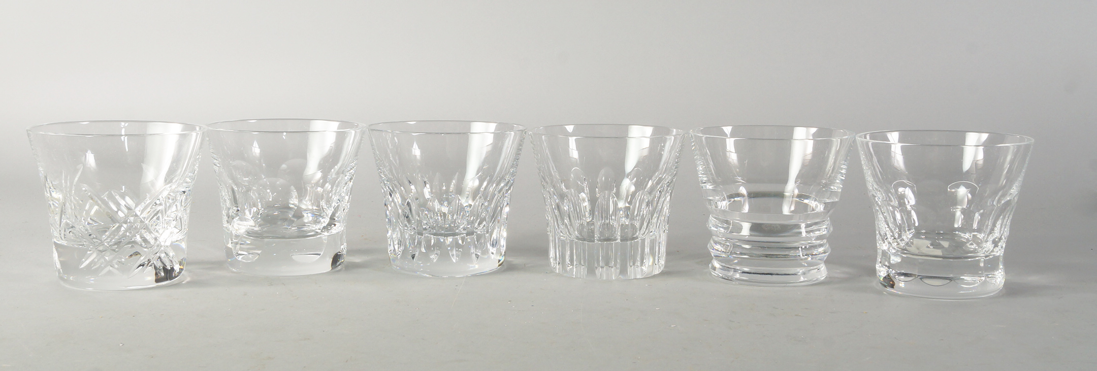 A set of six Baccarat glass tumblers, 20th century, each glass of different design, 8.