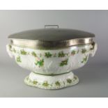 A large oval printed pottery Dairy Outfit tureen, 19th century, with rams head handles,