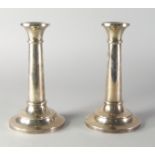 A pair of George V silver candlesticks, Birmingham c.