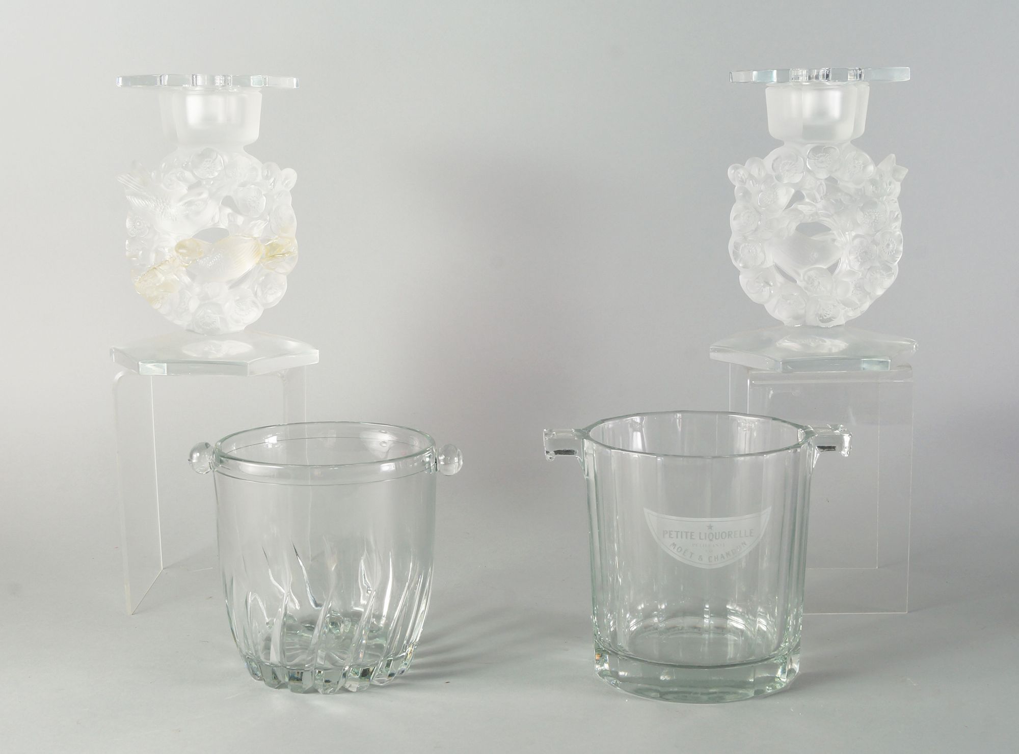 A Moet and Chandon glass faceted ice bucket,