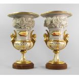 A pair of German porcelain gilt and flower encrusted floral campana urns, early 19th century,