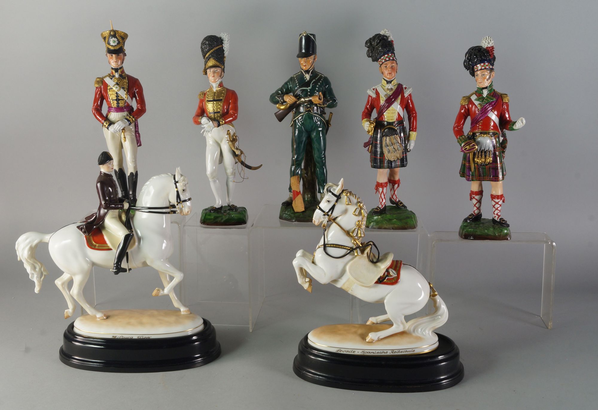 A collection of five Sizendorf porcelain figures of soldiers, 20th century,