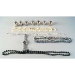 Four various faux pearl necklaces, a ladies quartz wrist watch,