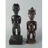 Two Tribal hardwood fertility figures, Baule, late 19th/20th century,