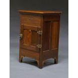 A walnut ice chest, late 19th/early 20th century, with lifting lid to reveal an open storage space,