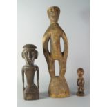 Three Tribal hardwood figures, late 19th/20th century,