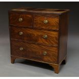 A George III mahogany rectangular chest of two short above two long drawers on bracket feet,