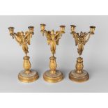A set of four French gilt bronze and mother of pearl twin branch candlesticks, 19th century,