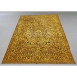 A woven silk wall hanging, 20th century, with a central medallion, surrounded by lions,