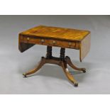 A George IV mahogany side table, the rectangular top with two end flaps, with two frieze drawers,