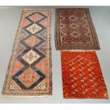 A Turkmen rug with eight octagons,178cm x 101cm, small Afghan rugs , 116cm x 54cm, 73cm x 40cm,