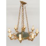 A French eight light Empire style gilt and green patinated metal chandelier, 20th century,