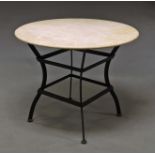 A circular table, late 20th century, with travertine top on splayed cast iron legs,