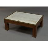 A teak and brass mounted rectangular coffee table, 20th century,