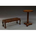 A William IV rosewood octagonal table, with conforming central column, on trefoil form base,