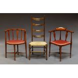 An Arts and Crafts ladder back hall chair, and two Edwardain corner chairs,